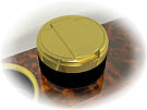 Flip-up Lid Ashtray Insert for cupholders. Lid closed.
